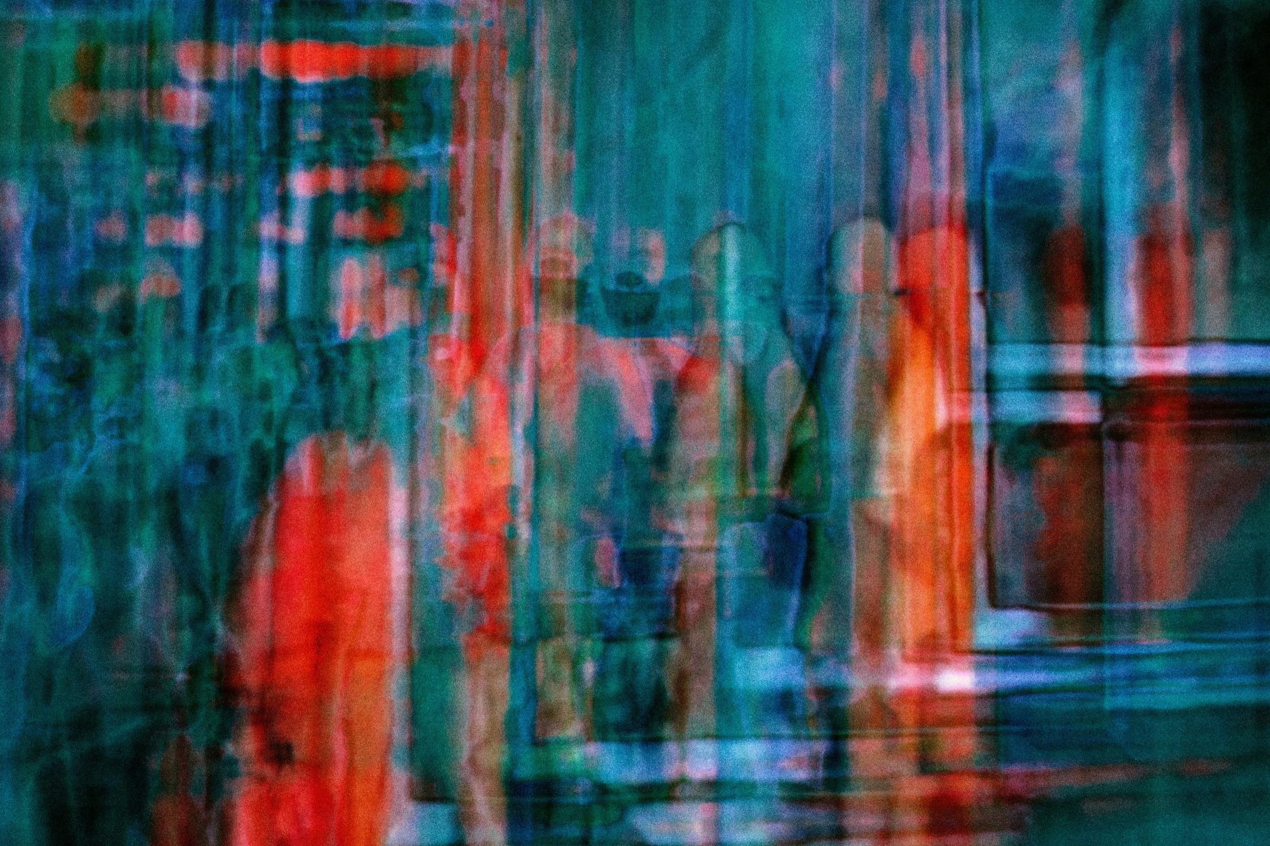 Layered abstract reflections in blue, teal and red